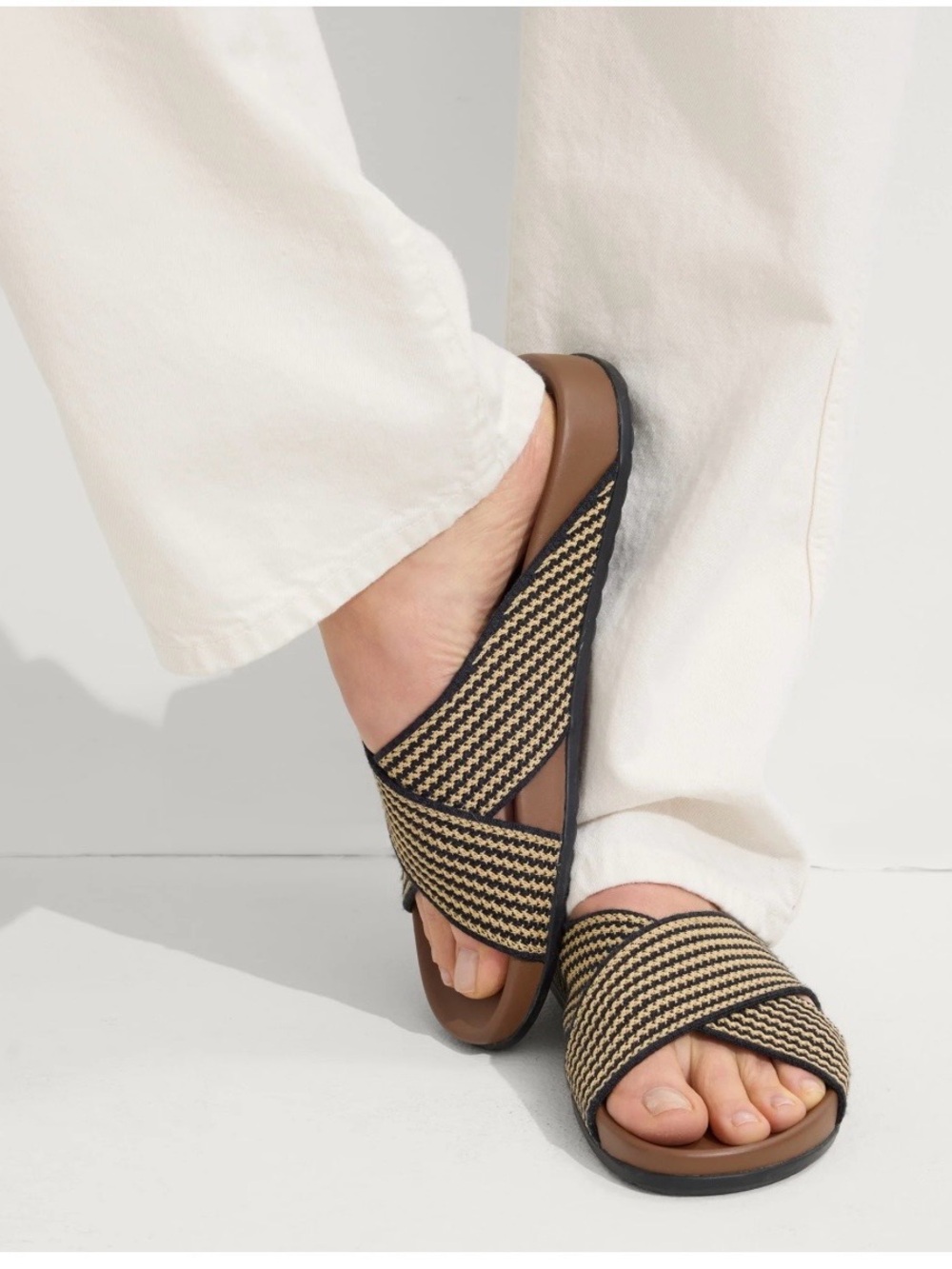 Rothy's ‘The Weekend’ slides in Tan and Black